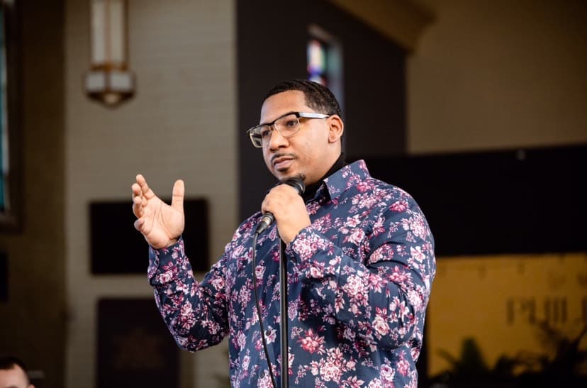 Wesley Robinson facilitating with a microphone